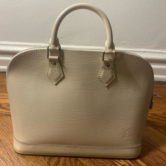 Louis Vuitton
Alma Handbag white Epi Leather PM - Picture 14 of 16
